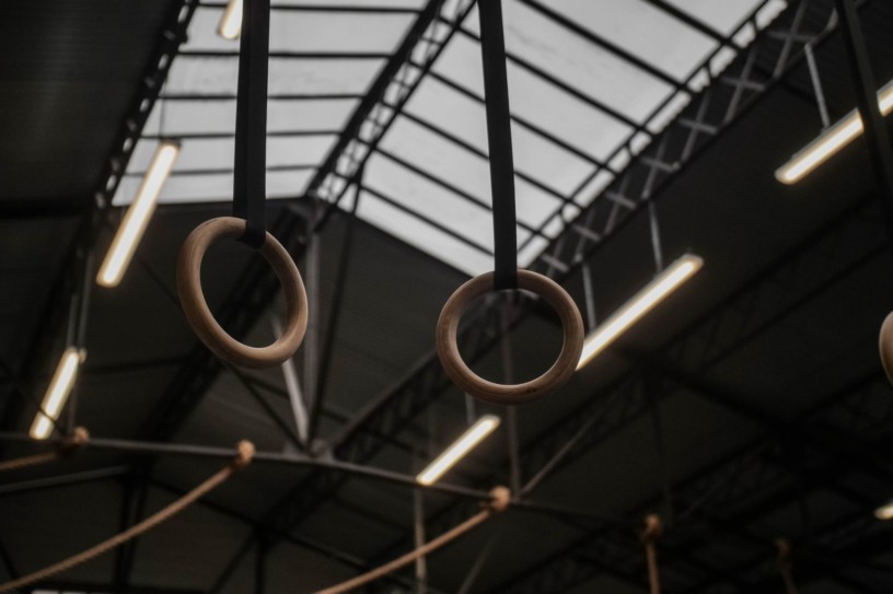 Gymnastic Rings hanging down from the Ceiling.