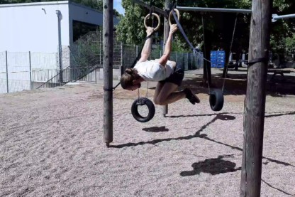 Me doing a Tuck Back Lever on the Gymnastic Rings.