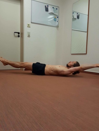 This is me performing a straight hollow body hold.