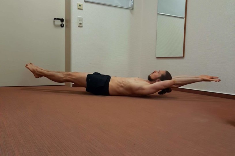 This is me performing a straight hollow body hold.