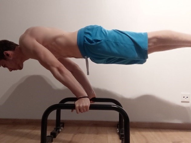 This Image shows Vladimiros from Workoutclarity performing a Full Planche.