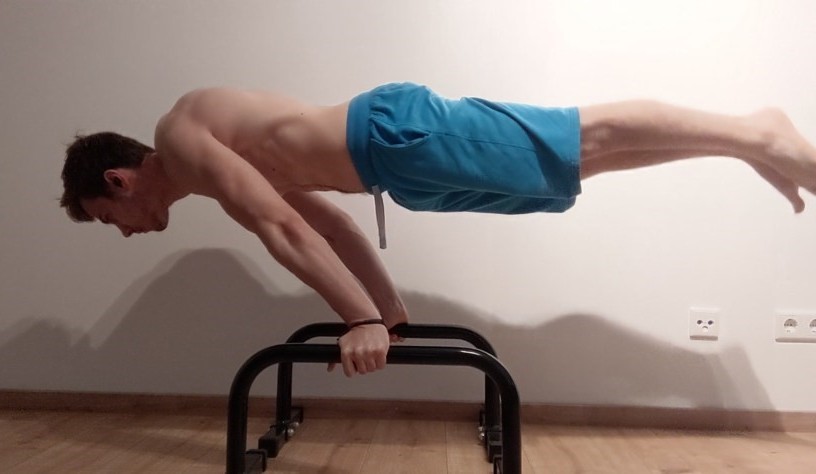 This Image shows Vladimiros from Workoutclarity performing a Full Planche.