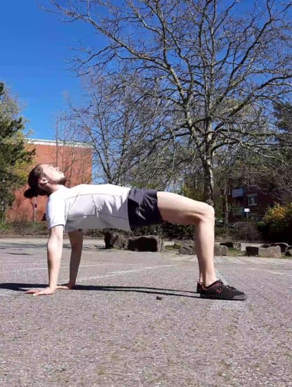 This image shows me performing a yoga table top pose.