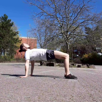 This image shows me performing a yoga table top pose.