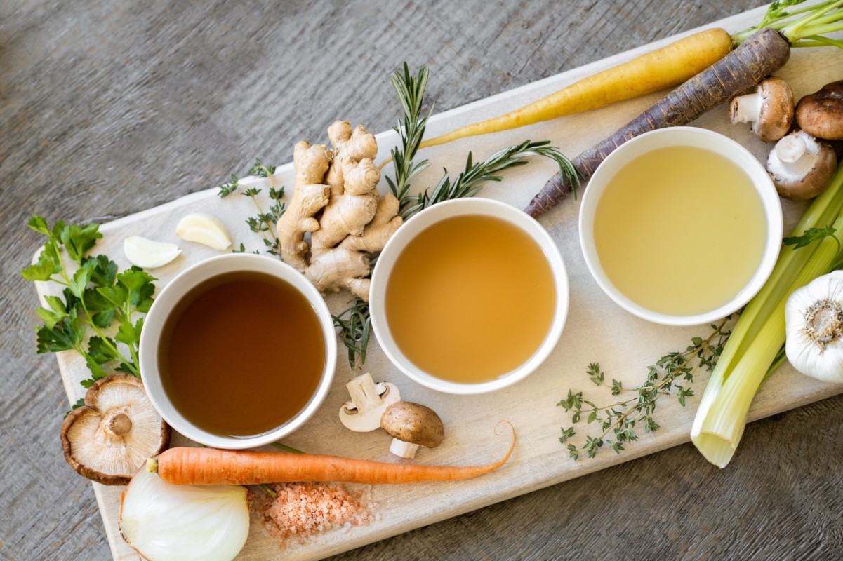 This image shows bone broth in a few bowls. Bone broth is rich in collagen and connective tissues.